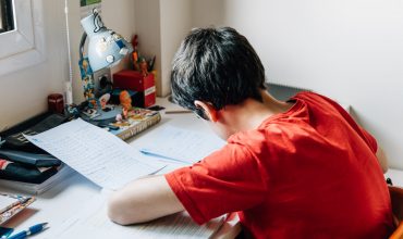 Young male student preparing for exams at home Young male student preparing for exams at home